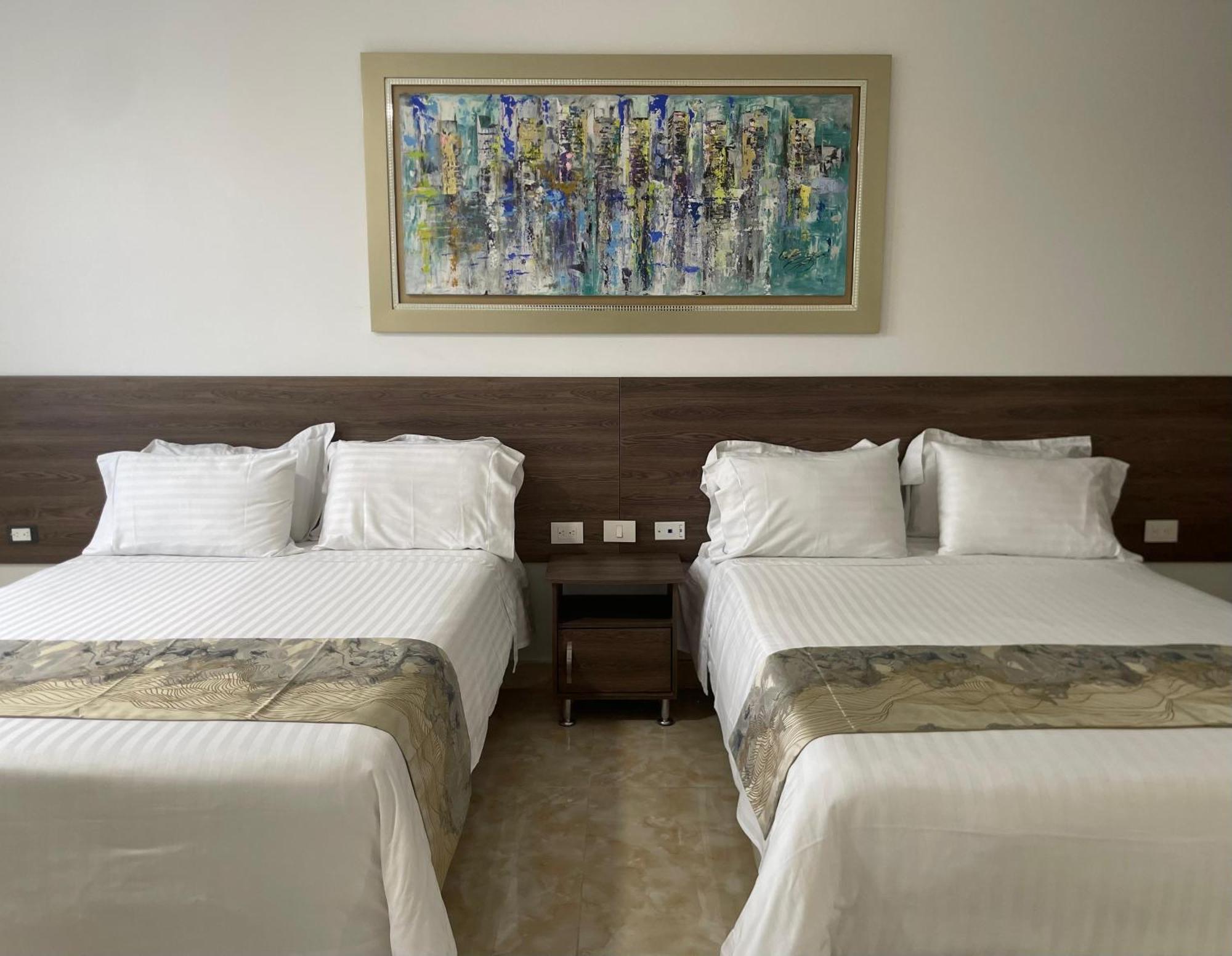 Hotel Royal Elim International カリ エクステリア 写真 A room at the hotel